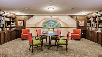 Interior common area with bookshelves and seating
