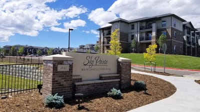 Exterior sign showing Sky Pointe Retirement Resort