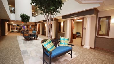 A bright interior view of the community center with seating