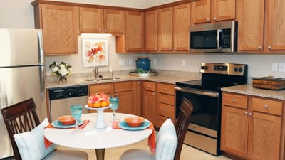 Bright kitchen area with table settings and decor