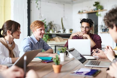 Group of people collaborating at a table