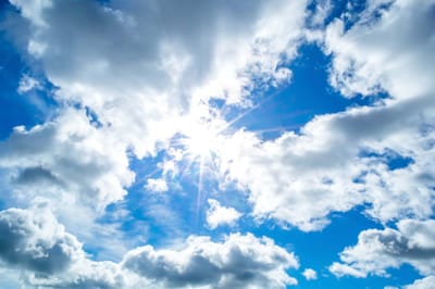 Bright blue sky with clouds