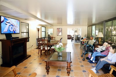 Residents watching television in a common area