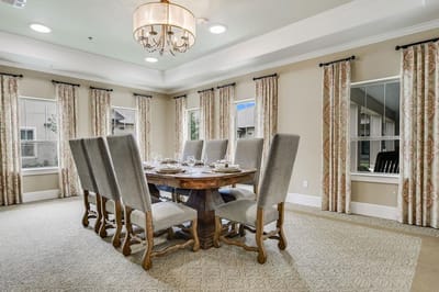 Elegant dining room setup with a large wooden table