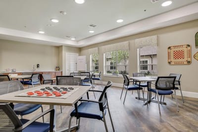 Interior common area with tables for activities