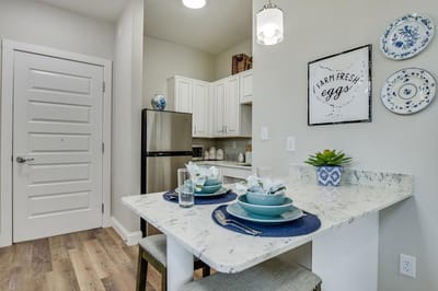 Modern kitchenette with dining setup
