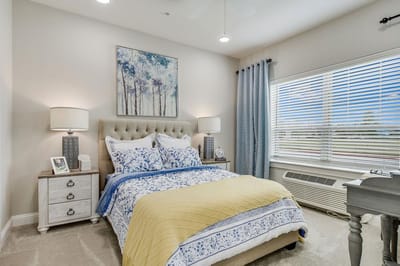 Cozy resident bedroom with soft lighting and decor