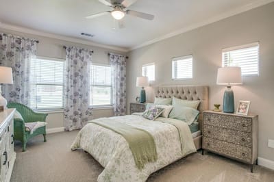 Cozy bedroom with bedding and decorative accents