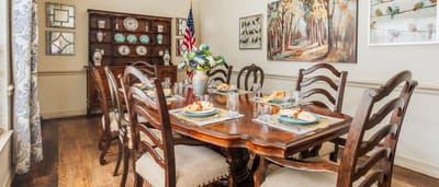 Dining room set with meals prepared for residents