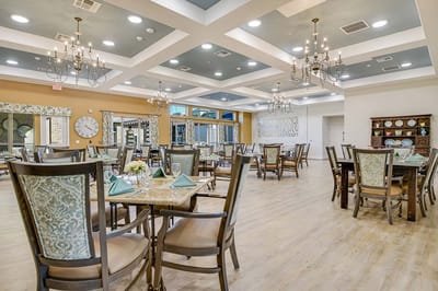 Bright dining area with elegant tables and decorations