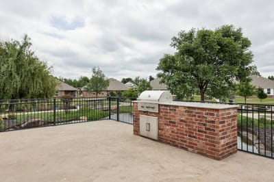 Outdoor barbecue area with view of the grounds