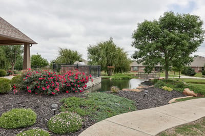 Beautiful garden area with flowers and a pond