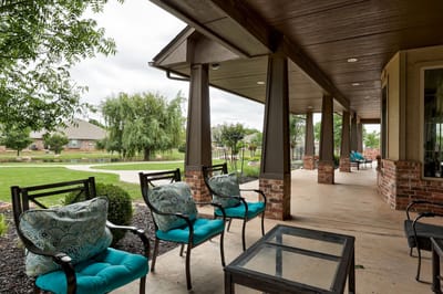 Outdoor seating area with views of landscaped grounds