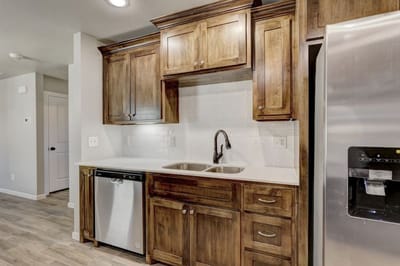 Modern kitchen interior with wooden cabinets and appliances