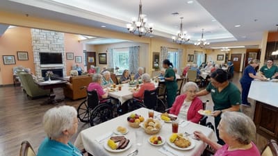 Residents enjoying a meal in the dining area
