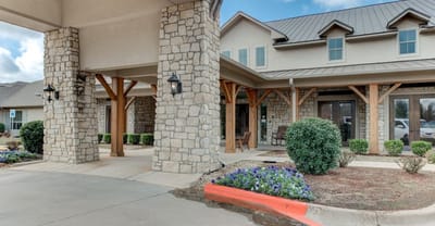 Exterior view of the Autumn Wind Senior Living facility entrance