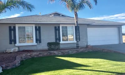 Exterior view of a house with landscaping
