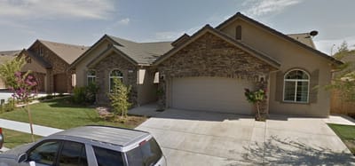 Exterior view of a residential building with landscaping
