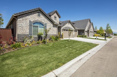 Exterior view of a residential building in a landscaped setting