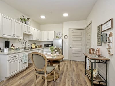 Bright interior view of a modern kitchen and dining area