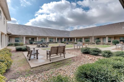 Outdoor courtyard with seating and pathways