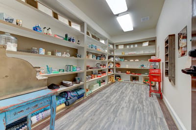 Interior view of a storage room with shelves and supplies