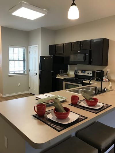 A well-decorated kitchen area with dining setup