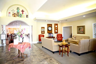 Bright common area with seating and decor