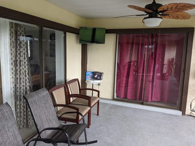 Outdoor seating area with view of the interior space