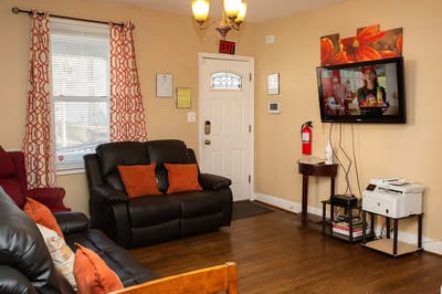 Interior view of a cozy common area with seating