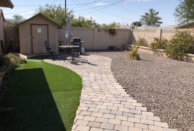 Outdoor space with pathway and seating area