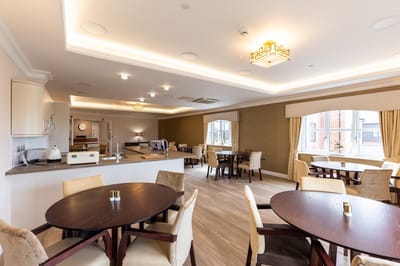 Modern dining area with tables and chairs