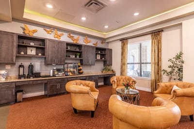 Common area with seating and butterfly decor
