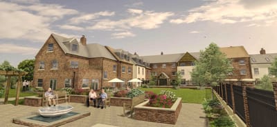 Outdoor garden area with residents relaxing