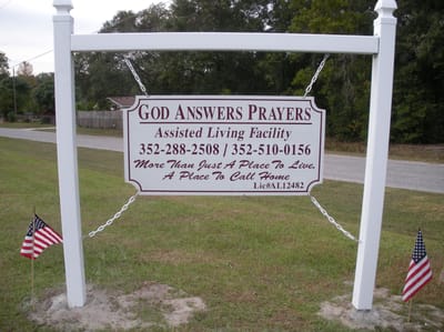 Sign for 'God Answers Prayers' assisted living facility