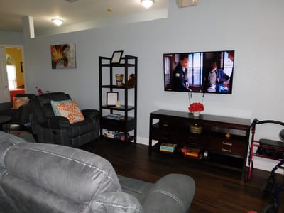 Cozy living room with a TV and seating area