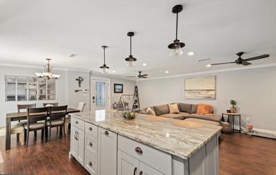 Bright common area with seating and dining space