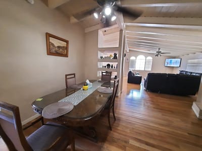 Interior dining area with a large table and seating