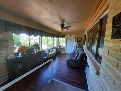 Bright common area with seating and plants