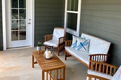 Outdoor seating area with wooden furniture
