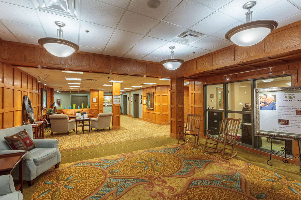Common area with seating and information display.