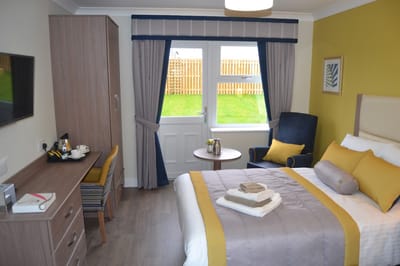Bright and inviting resident room with modern decor