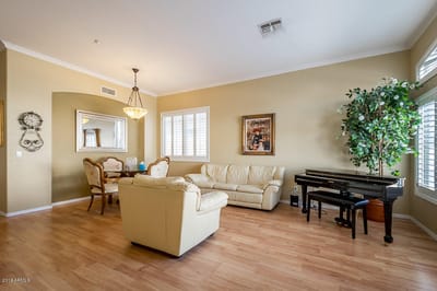 Cozy common area with seating and piano