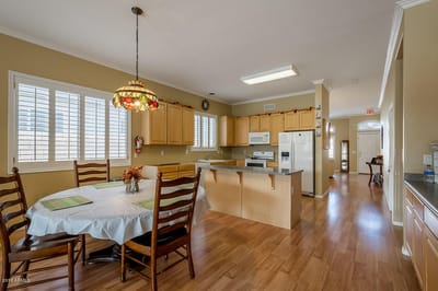 Bright kitchen area with dining table and chairs