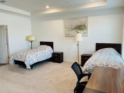 Interior view of a shared resident room with two beds