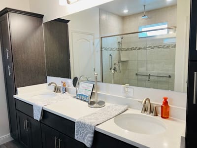 Elegant bathroom with dual sinks and modern fixtures