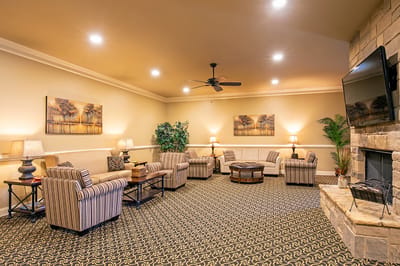 Cozy common area with seating and artwork