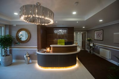 Reception area of a luxury care home with modern decor