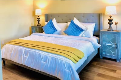 Brightly decorated resident bedroom with yellow accents