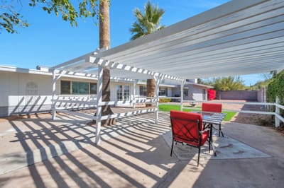 Outdoor seating area with shaded pergola